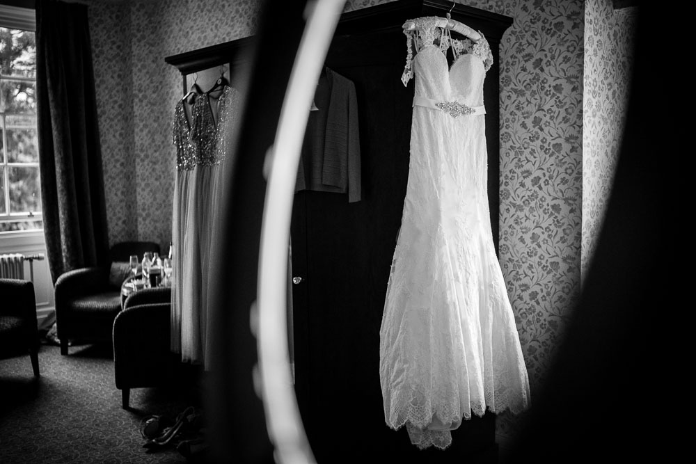 wedding dress hung up at mottram hall