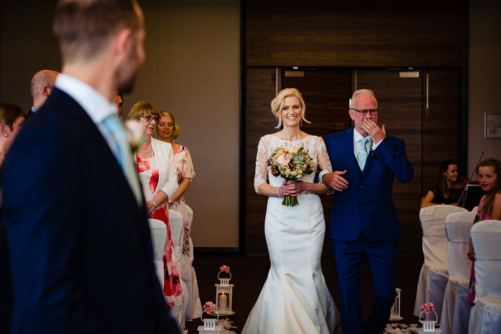 bride walking up the ailse