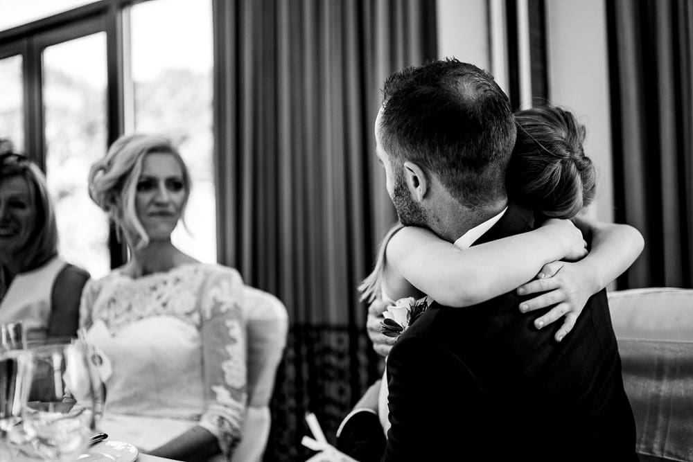 daughter hugging dad