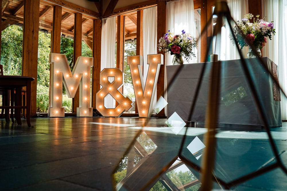 The Word is Love Light Up letters at Oak tree of peover wedding