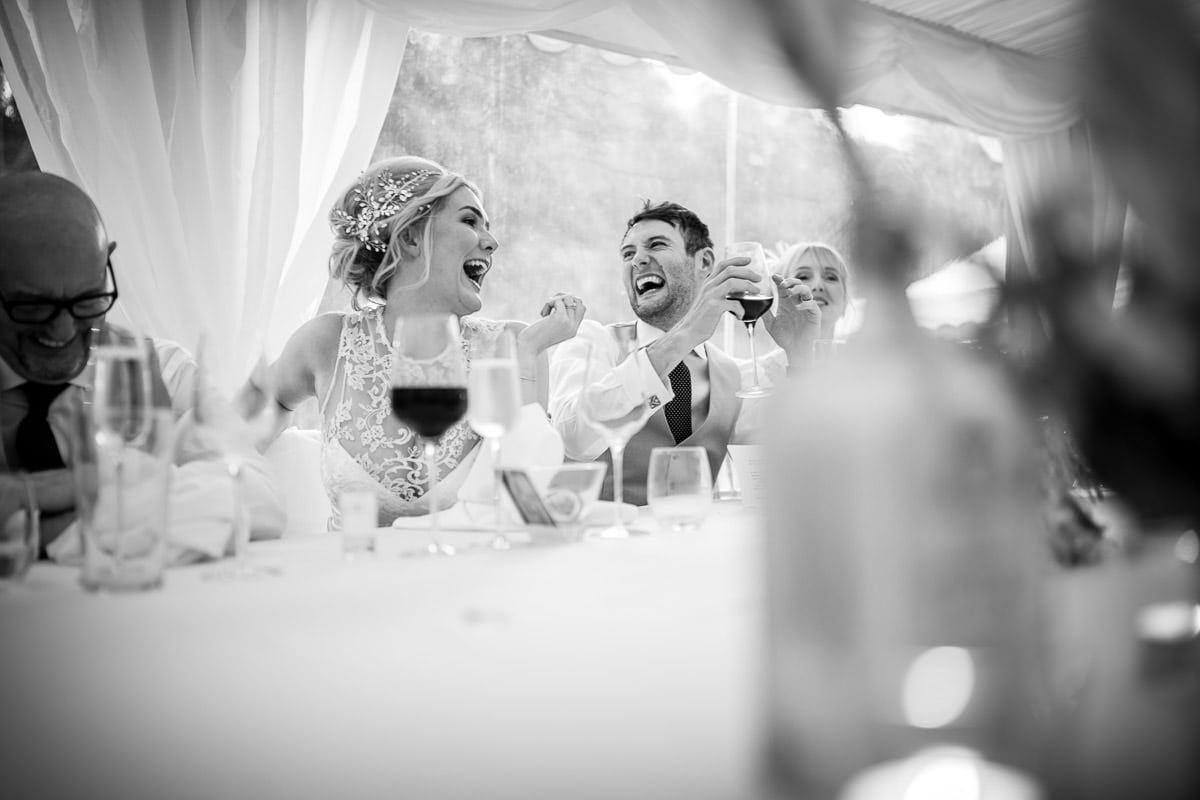 wedding top table laughing