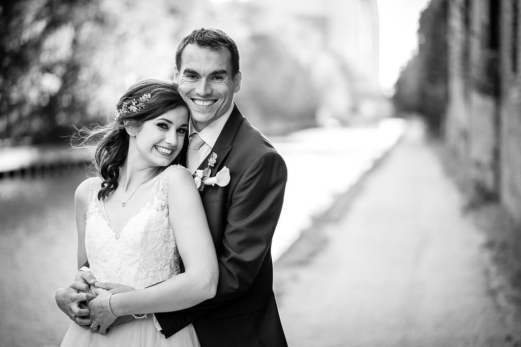 black and white photo of happy couple at victoria warehouse