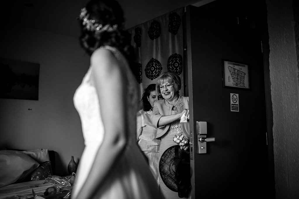 mum seeing daughter in her wedding dress