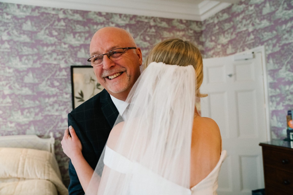 dad hugging daughter at knowsley hall