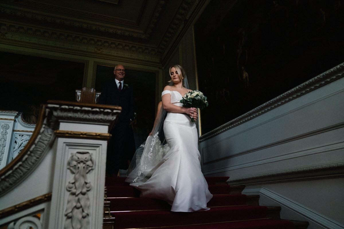 bride on staircase at knowsley hall