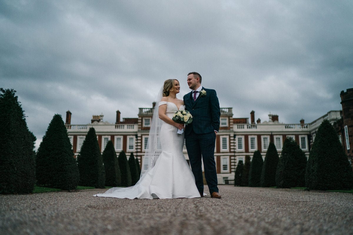 wedding couple in front of knowsley hall