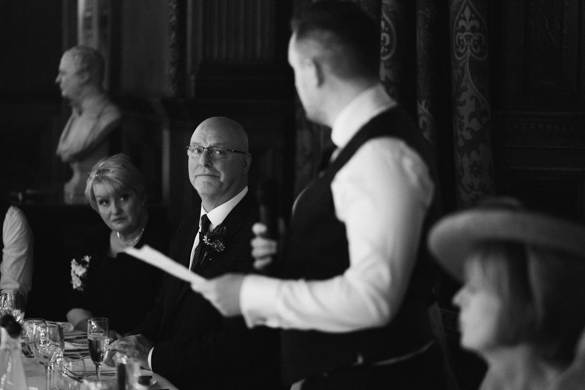 father of the bride looking at the groom