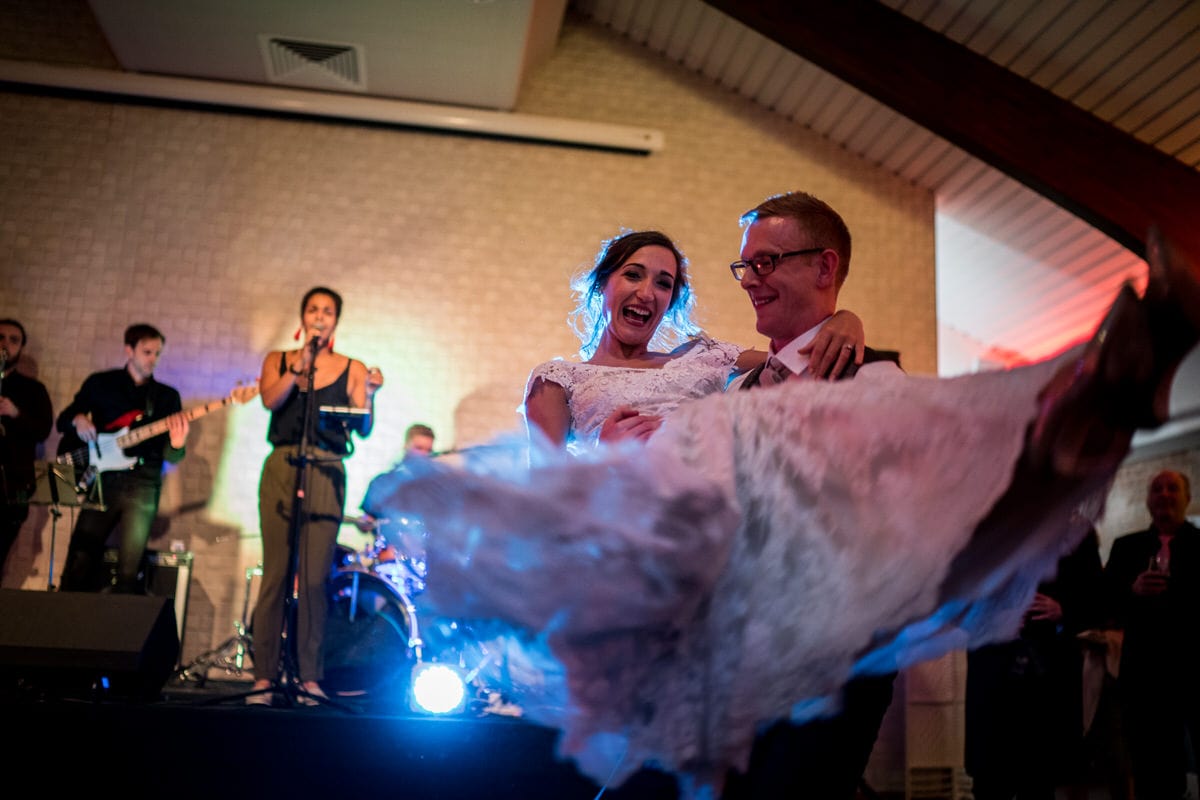 groom spinning bride around