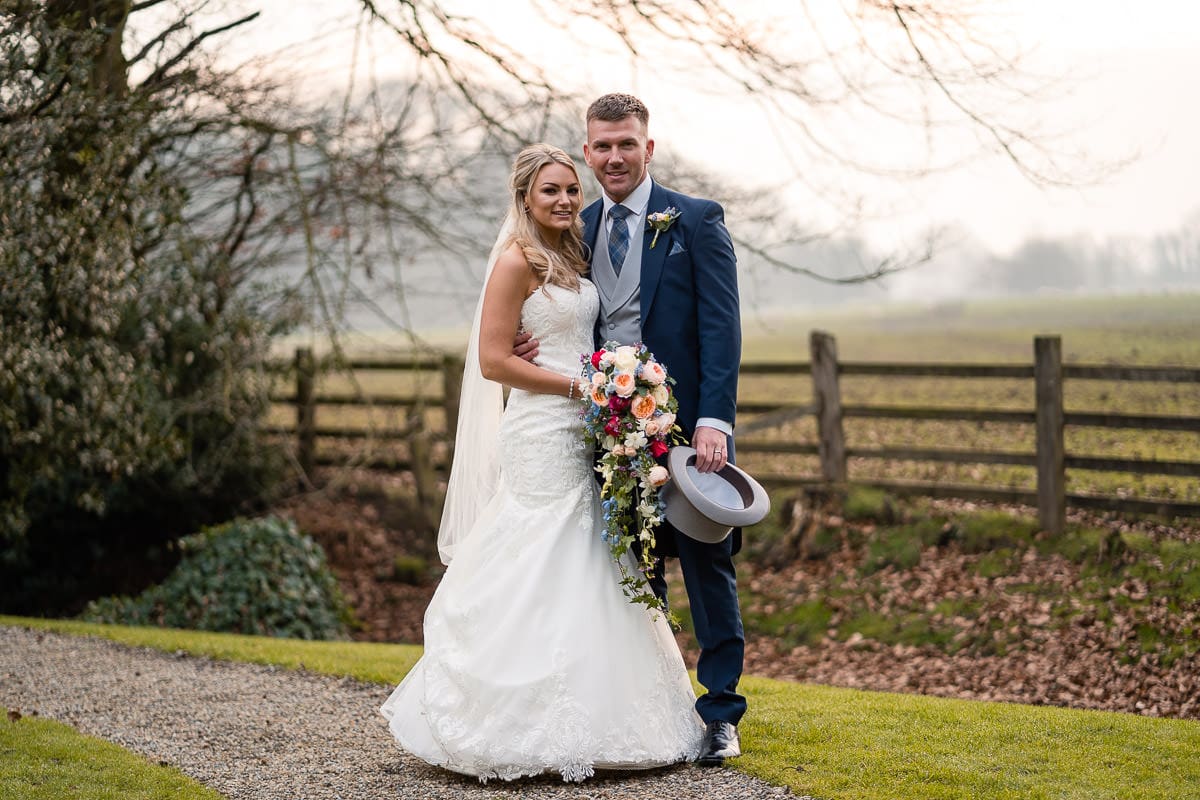 posed photo of couple at mitton hall wedding