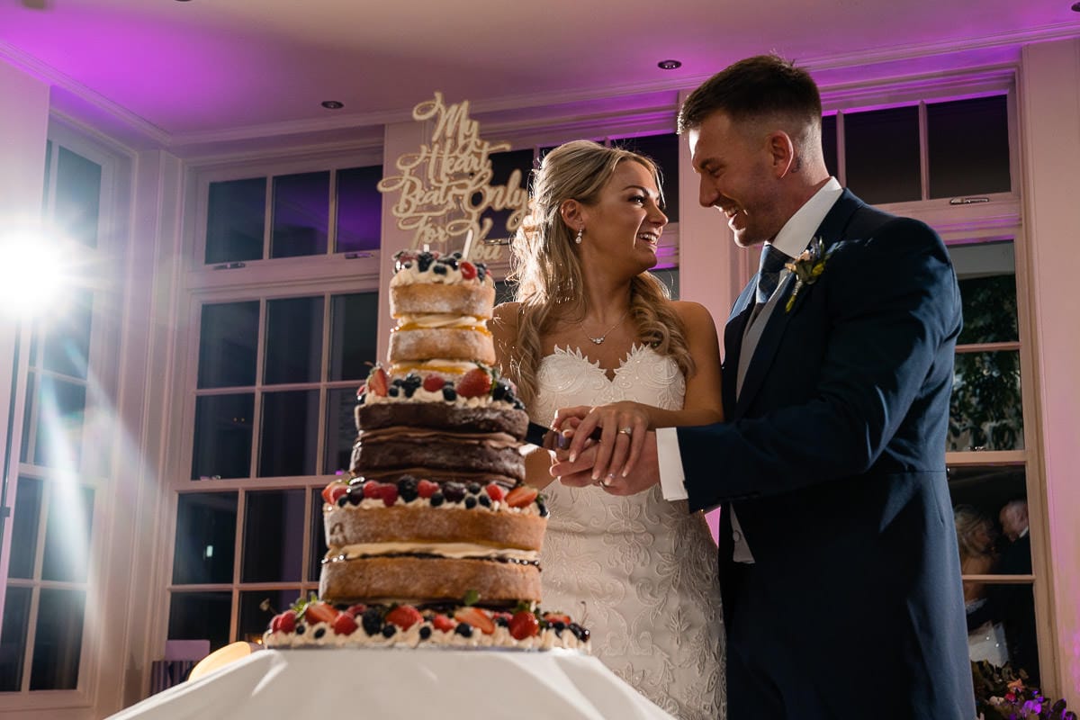 cake cutting at mitton hall wedding