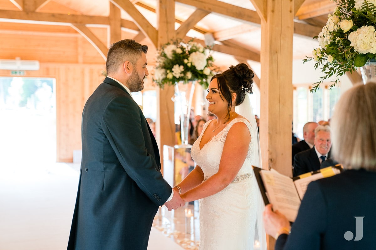 exchange of wedding vows at Colshaw Hall