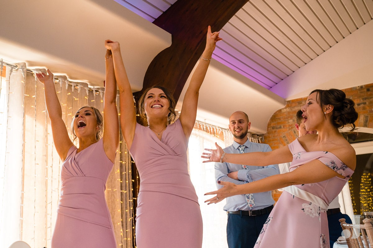 happy bridesmaids cheering