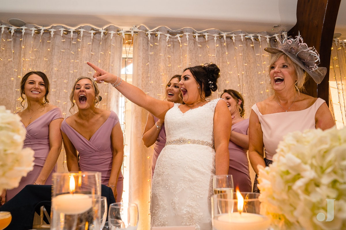 laughing bride at speeches at Colshaw Hall