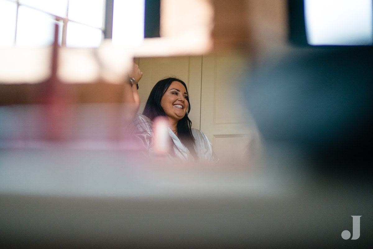 Bride in a mirror at Colshaw Hall