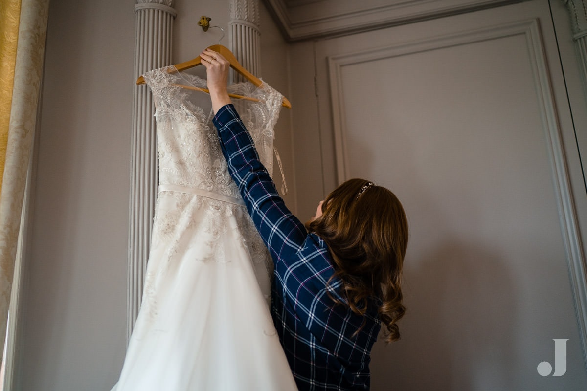 bride hanging up her dress at Thornton Manor