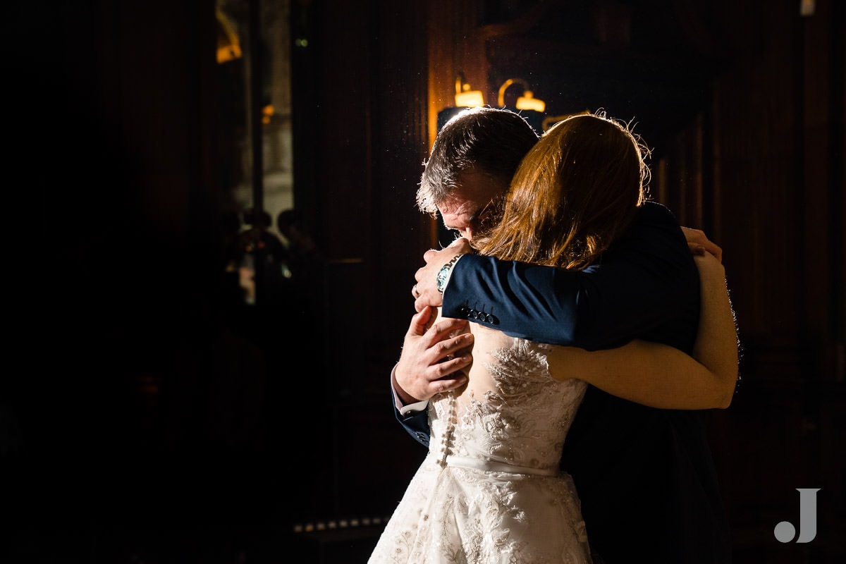 bride and groom hugging at Thornton Manor