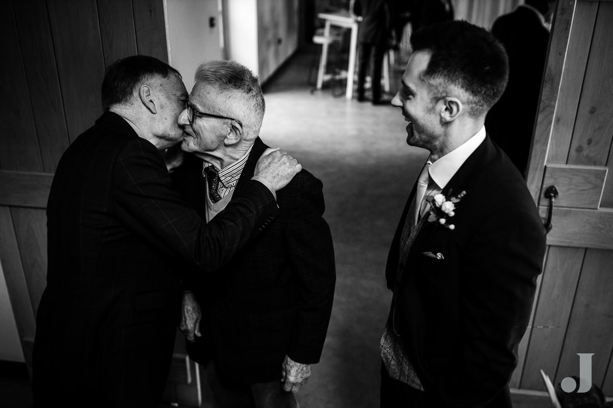 hugs before the wedding at the holford estate