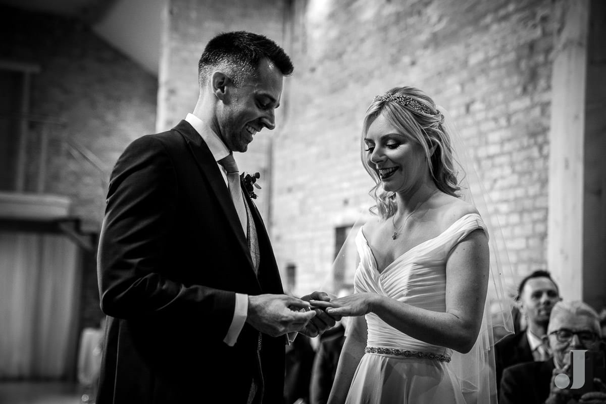 exchange of wedding rings at the holford estate