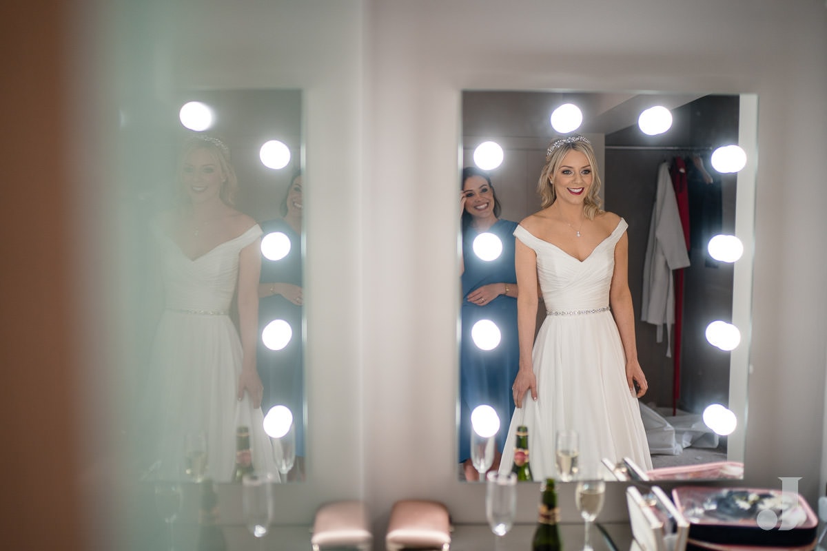 bride in mirror at the holford estate